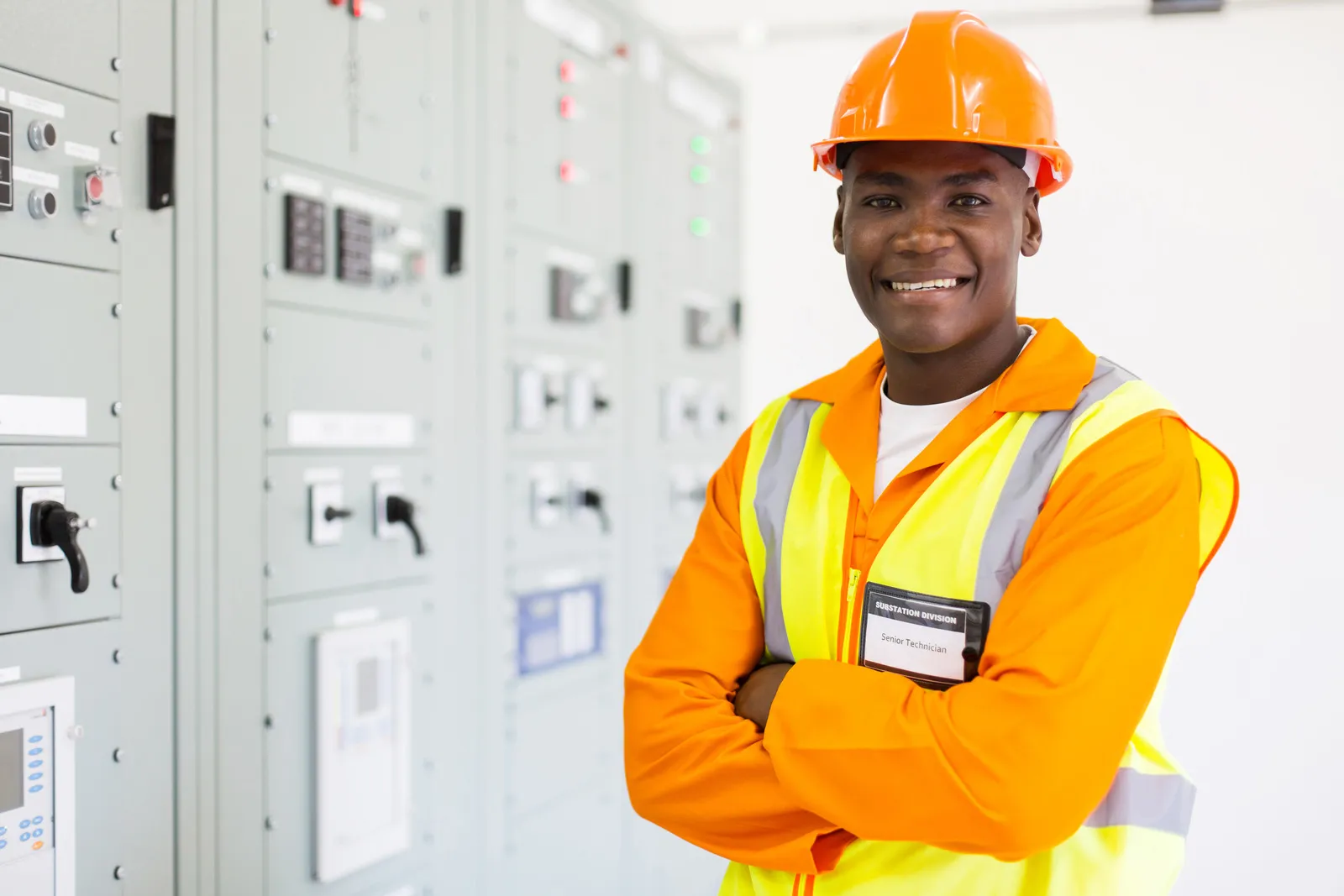 Smiling Minor's Electric electrician in a hard hat